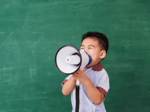 # Managing Repetitive Speech in Autism: Strategies and Techniques Repetitive speech in individuals with Autism Spectrum Disorder (ASD) can present unique challenges. However, with appropriate strategies and approaches, improvements can be made to better manage this aspect of ASD. Here are some strategies and techniques that can influence positive changes: ## 1. Functional Communication Training (FCT) FCT is a technique that guides an individual to replace problem behavior, like repetitive speech, with more appropriate and effective communication behavior. This could range from words and sentences to other means like sign language or the use of communication tools. **Example:** If an individual repeats a phrase like, "I want cookie," teach them to express what they want through other communicative methods like pointing to pictures or using an app on a tablet. ## 2. Prompt and Fading Technique This involves the use of verbal or physical prompts to guide correct behavior, with the prompt's intensity gradually reduced (or "faded") over time as the individual begins to respond independently. **Example:** You might initially hand-over-hand help them point to a picture of the object they desire, gradually reducing your level of assistance as they begin to master the skill. ## 3. Modeling Appropriate Speech Modeling involves the caregiver exhibiting appropriate speech behavior, then encouraging the individual to imitate it. **Example:** You could say a sentence like, "I would like some water, please" and ask the individual to repeat the sentence. Over time, this can help form patterns of more appropriate speech. ## 4. Scripting Scripting can help the individual learn more complex conversations. Scripts are learned and practiced phrases or sentences that can be used in everyday social interaction. **Example:** A script might be: "Hi, my name is \[name]. How are you today?" As the individual becomes comfortable with this script, you can introduce more complex scripts to cover different social scenarios. ## 5. Reinforcement Strategy This strategy reinforces the completion of an appropriate behavior by delivering a reward, which can motivate the individual to repeat that behavior. **Example:** If the individual successfully uses a newly learned sentence in conversation without falling into repetitive speech, they might be reinforced with verbal praise, a favorite activity, or a small treat. ## 6. Speech and Language Therapy Speech and language therapists use techniques to enhance language development and improve communication skills. This can be very beneficial in managing repetitive speech in individuals with ASD. While these are broad strategies, every person with ASD has unique needs and abilities. It's important that any intervention should be personalized and carried out at the individual's pace. Consult a healthcare provider or speech and language therapist for a tailored approach to managing repetitive speech.